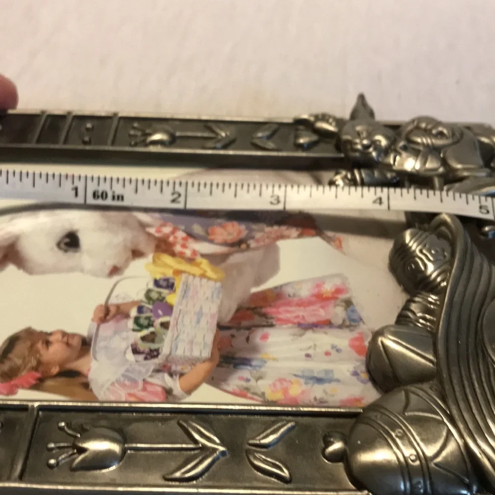 Silver metal rabbit with wheel barrel of eggs picture frame.